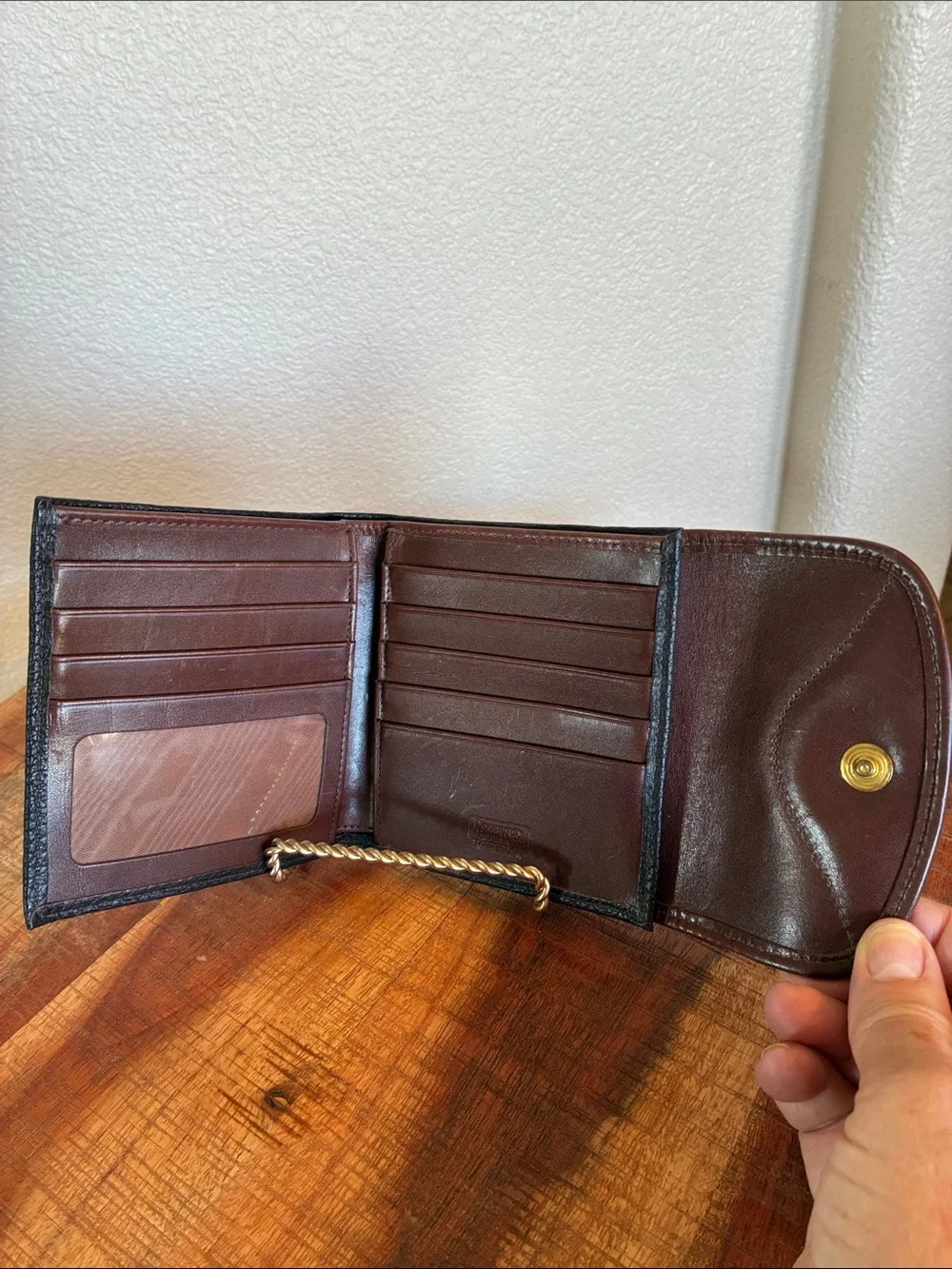 Dooney & Bourke wallet 1  Black Pebbled Leather Wallet with Brown Trim GUC